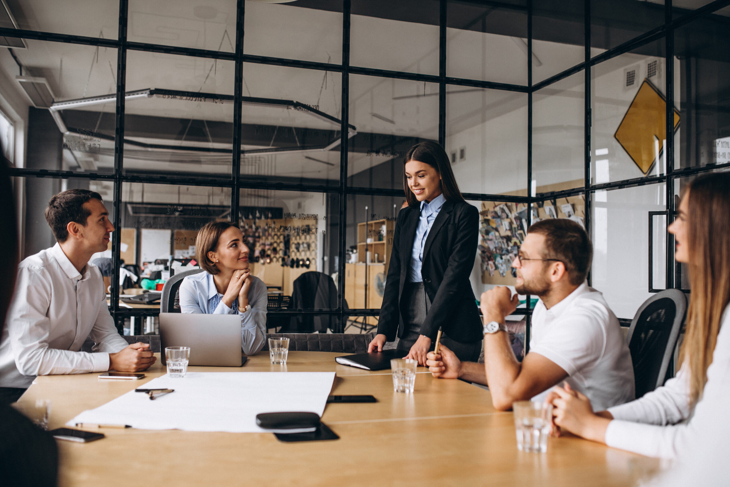 group of people working out business plan in an office
